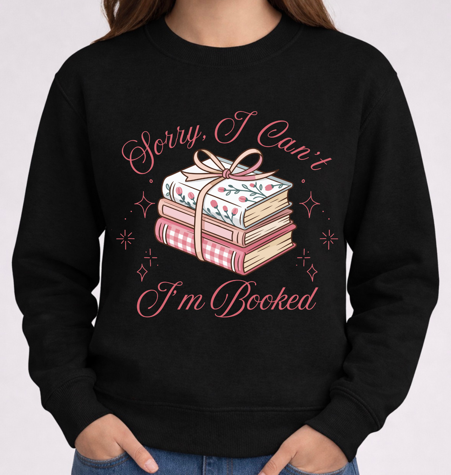 Black sweatshirt with book-themed design and text on a white background