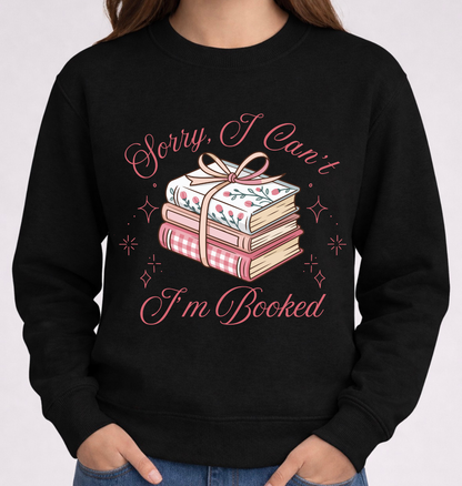 Black sweatshirt with book-themed design and text on a white background